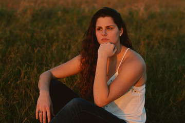 Gorgeous Female Model Posing in Tall Grass Outside