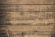 old vintage wooden boards cracking and peeling black paint