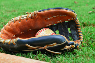Poster - Baseball in glove for sport image, shows ball caught in mitt closeup.  Great ball season or league graphic.