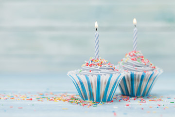 Sweet cupcakes with candles