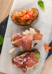 Italian bruschetta on slate board