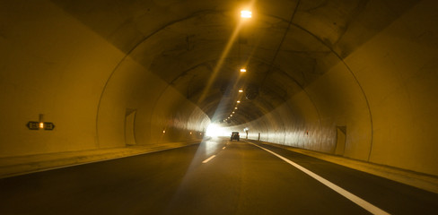 Tunnel road with two lane highway. Modern tunnel on highway, detail of road transport. Transport system concept.