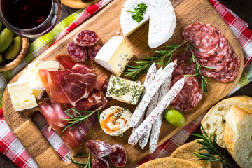 Sticker - Antipasto - sliced meat, ham, salami, cheese, olives on wooden b