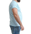© New Africa - Overweight man on white background