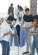 © ASDF - group of designers discuss men's suit