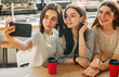 © Vadym - Three young friends having fun at coffee break