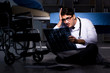 © Elnur - Doctor working night shift in hospital after long hours