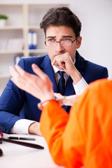 Lawyer meeting his client in prison