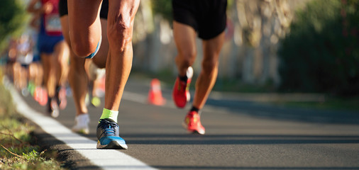 Wall Mural - Marathon running in the light of evening