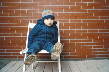 Wall Mural - Boy Sitting on Chair