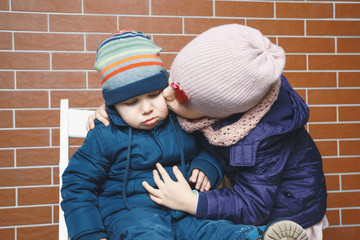 Wall Mural - Sister Kissing Brother