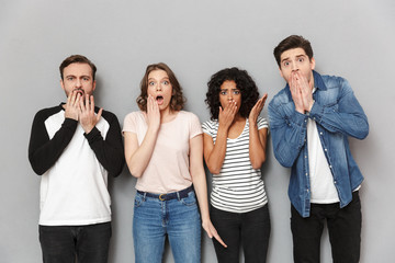 Poster - Shocked excited group of friends looking camera.