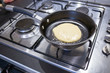 © Alexandre - Pancake fried in a pan