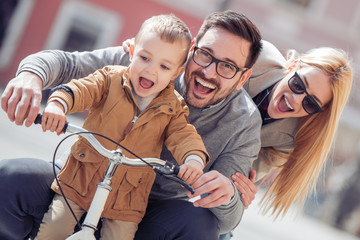 Wall Mural - Family having fun outdoors