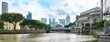 © Oleksii Fadieiev - Singapore, panoramic view from river bank to Cavenagh bridge with down-town skyscrapers in background