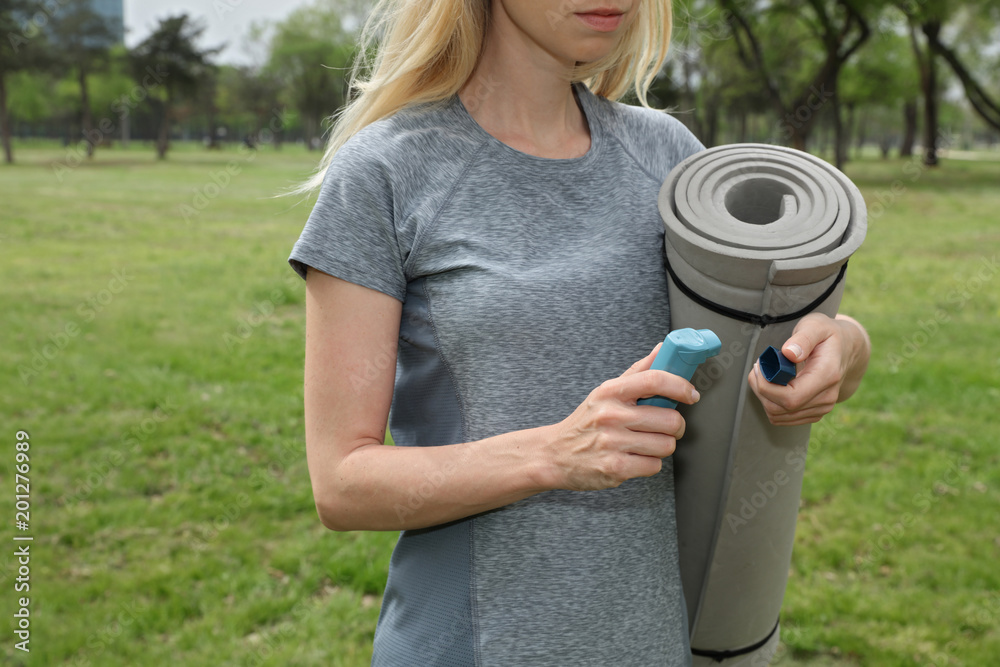 Athlete woman using asthma inhaler outdoors. Allergic Asthma Symptoms ...