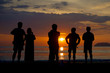 © jakHafiz - silhouette people watching sunset