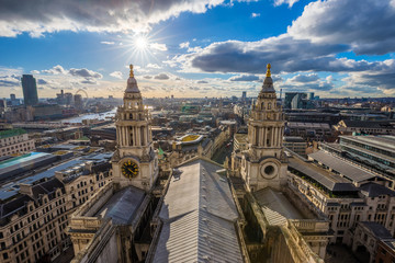 Wall Mural - London, United Kingdom - Aerial panoramic view of London with St.Paul's Cathedral at sunset with amazing sky and clouds