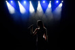© nagaets - Singer woman on stage