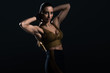 © LIGHTFIELD STUDIOS - attractive strong bodybuilder posing and showing muscles, isolated on black
