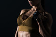© LIGHTFIELD STUDIOS - partial view of sexy sweaty muscular bodybuilder, isolated on black