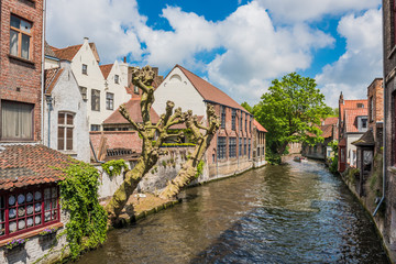 Wall Mural - Boats full of tourist enjoying Bruges