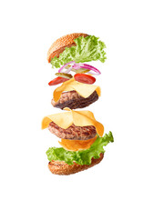 Double Cheeseburger Flying In Parts On A White Background. Isolate