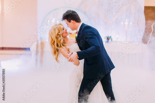 Fotografie, Obraz Happy bride and groom gracefully dance. Wedding celebration