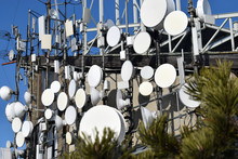 Antennas And Satellite Dishes Covering A Building, Telecommunication, Wireless And Broadcast Theme