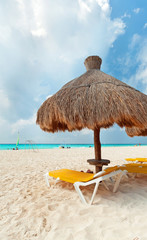 Wall Mural - Holidays under parasol on Caribbean beach