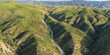 © kenkistler1 - Gravel road leads through a California canyon into the national forest.