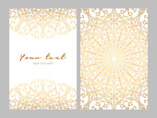 Wall Mural - Greeting card golden ethnic patterns on white background