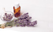 © Olga Ionina - Lavender oil with fresh lavender on a wooden background