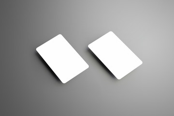 Business white mockup of a two  bank gift cards isolated  on a gray background