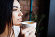 © F8  \ Suport Ukraine - Portrait of beautiful woman drinking coffee at modern cafe