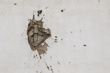 Bullet hole on building wall in Sarajevo