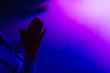 © Ivan - boy applauds in a room with blue and pink lighting