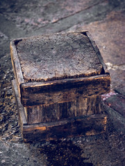 Wooden cube on floor