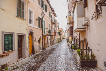  narrow street with buildings in Castel Gandolfo, Rome suburb, Italy