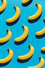 Background With Bright Bananas On Blue