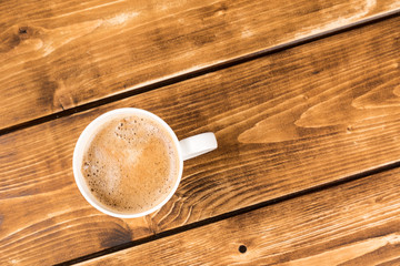 coffee cup on a wooden background