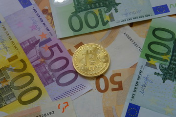 Euro in banknotes and coin bitcoin