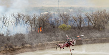 Heavy Firefighting Helicopter Drafts Water From The Colorado River
