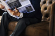 © Rawpixel.com - A businessman reading newspaper
