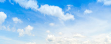 Wide Blue Sky Background With White Clouds