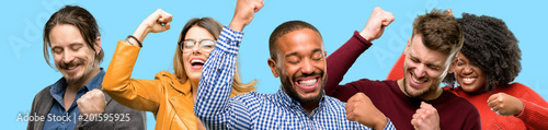 Fotomural Group of mixed people, women and men happy and excited expressing winning gesture