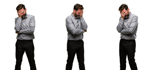 Canvas Print - Middle age man, with beard and bow tie stressful keeping hands on head, tired and frustrated