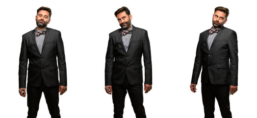 Canvas Print - Middle age man, with beard and bow tie with sleepy expression, being overworked and tired