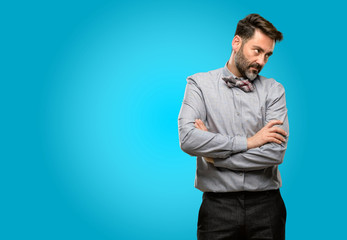 Poster - Middle age man, with beard and bow tie irritated and angry expressing negative emotion, annoyed with someone