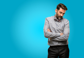 Poster - Middle age man, with beard and bow tie irritated and angry expressing negative emotion, annoyed with someone